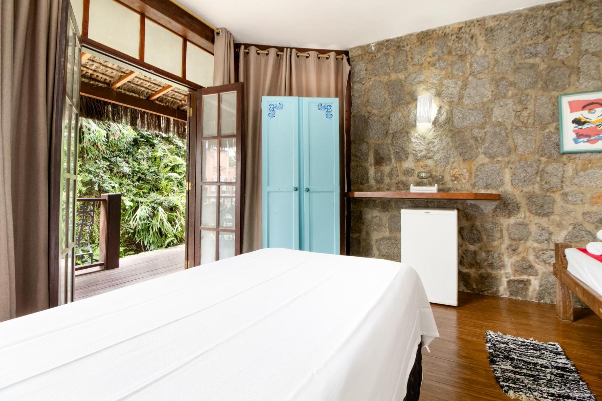 Velinn Pousada Guarubela Villa Vittoria Ilhabela Habitación foto